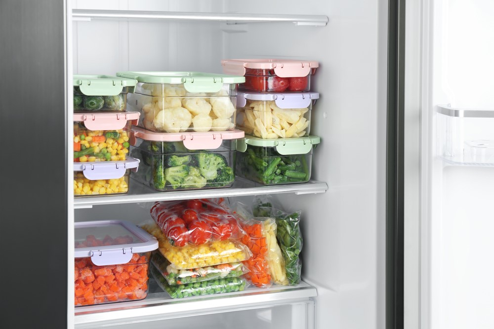 Food in containers in the fridge.