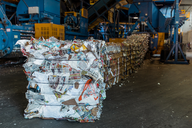 Newspaper is compacted in bales at a Miller recycling facility.