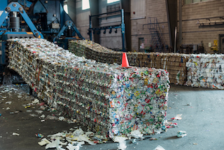Aluminum cans are baled at a Miller recycling facility.